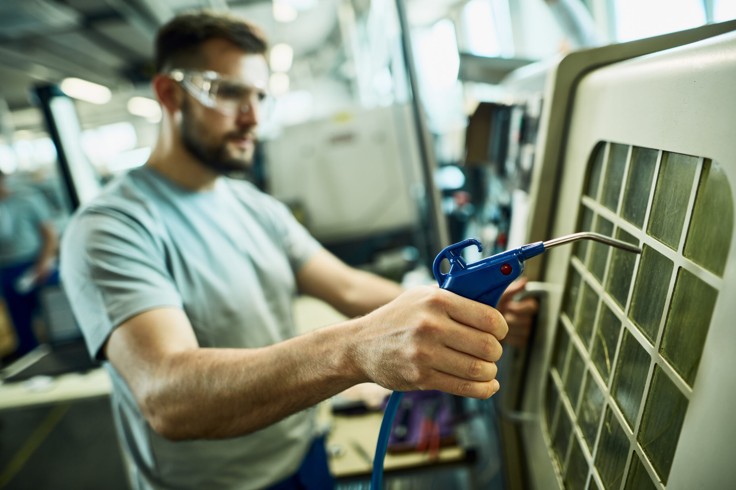 HVAC technician servicing an air conditioning system